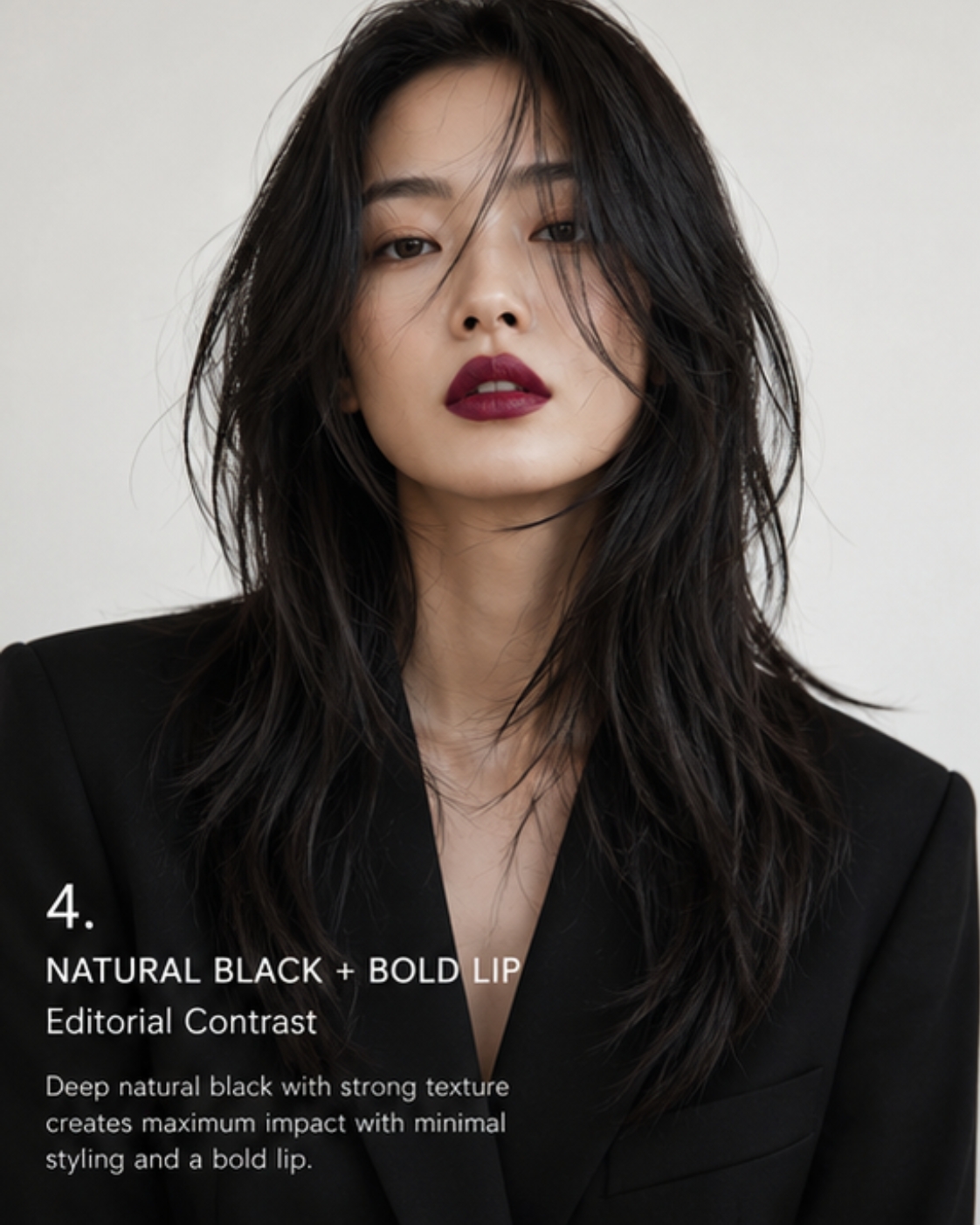 Editorial portrait of Asian woman with natural black lived-in texture and bold dark lip